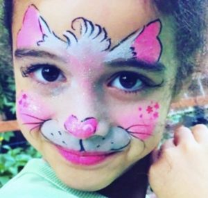 photo of kitty face painting by Kiki's Faces and Balloons NYC